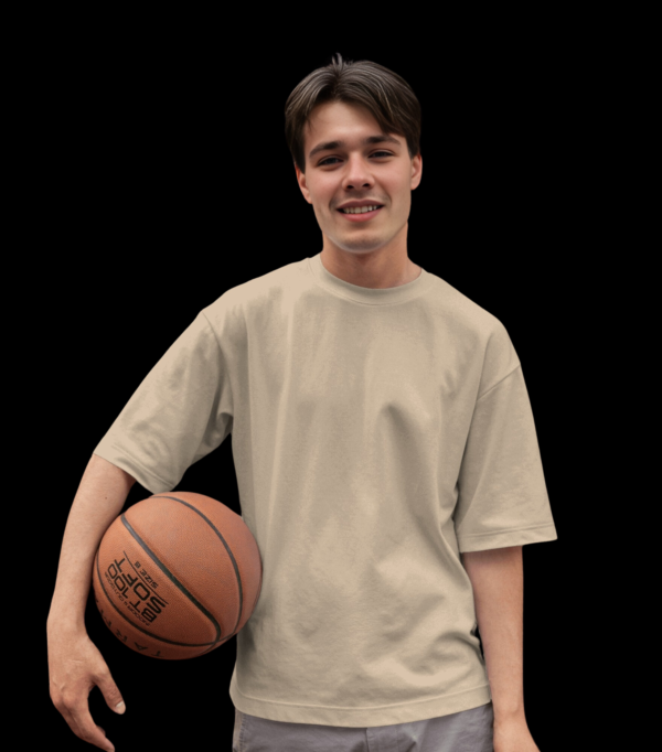 A boy wearing Beige Oversized T-shirt